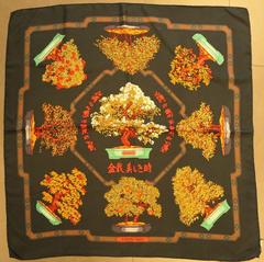 A variation of the Hermès scarf `Les beaux jours des bonsaï` first edited in 1991 by `Catherine Baschet`